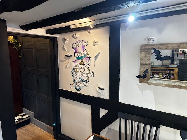 Alice in Wonderland mural at Queen of Tarts